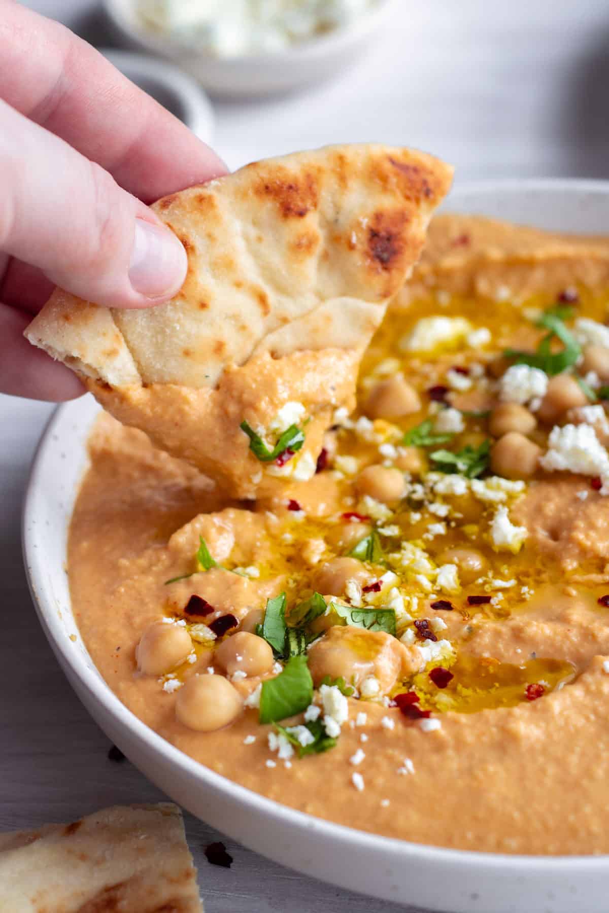 Buffalo Hummus in a white bowl.
