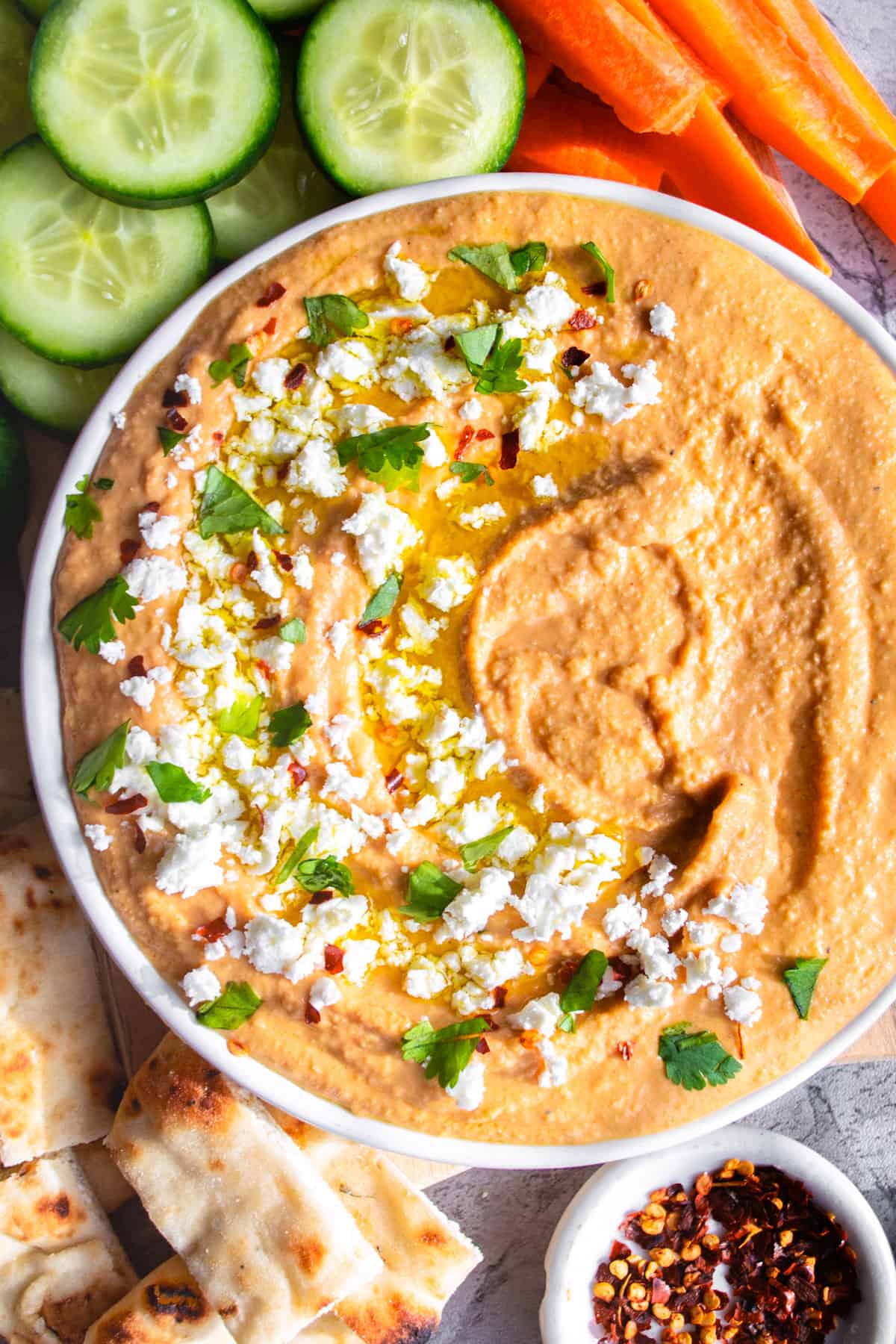 Buffalo Hummus in a white bowl.