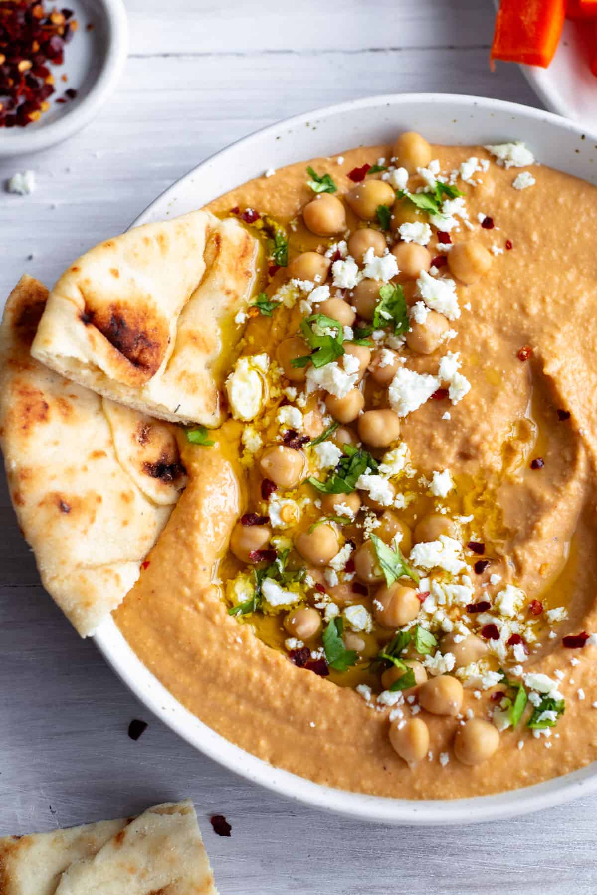 Buffalo Hummus in a white bowl.