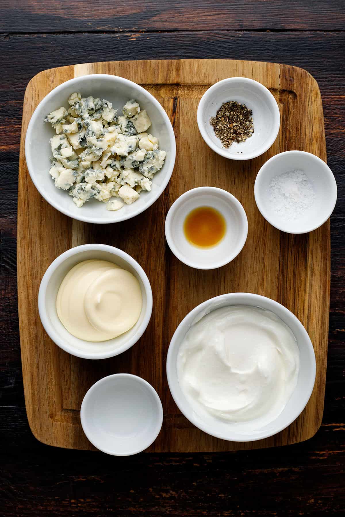 Ingredients for blue cheese sauce - on a cutting board.