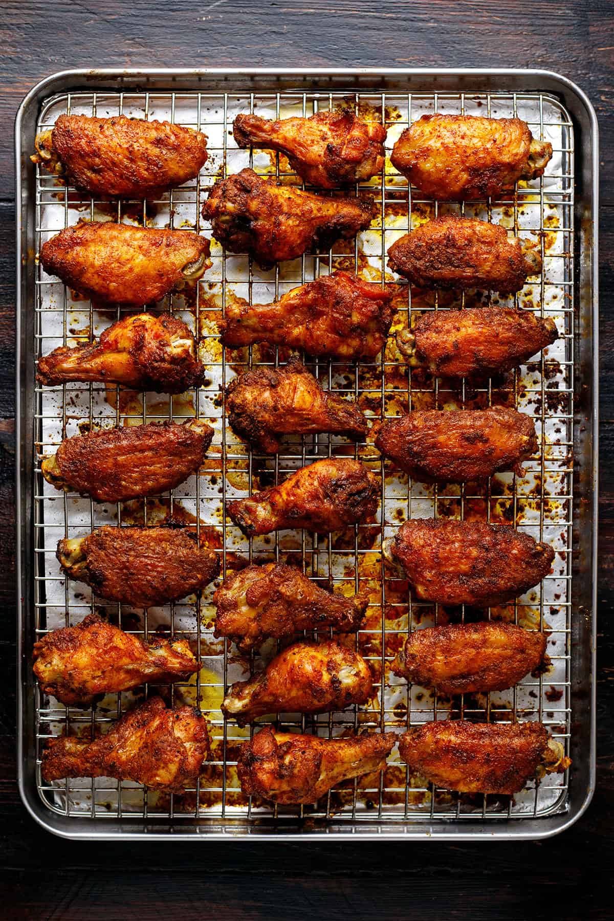 baked chicken wings on a rack.
