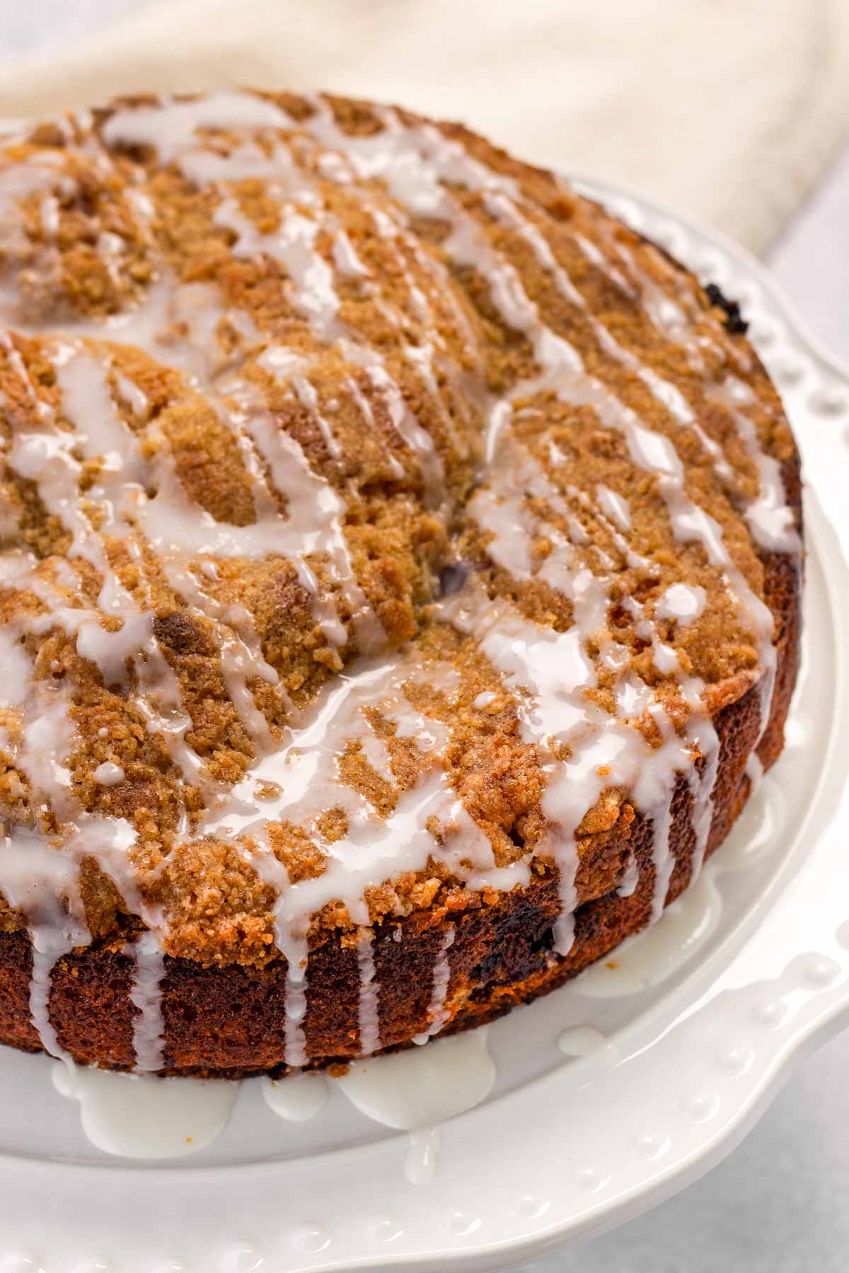 top streusel crust of blueberry coffee cake
