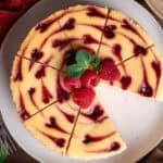 raspberry cheesecake on a platter.