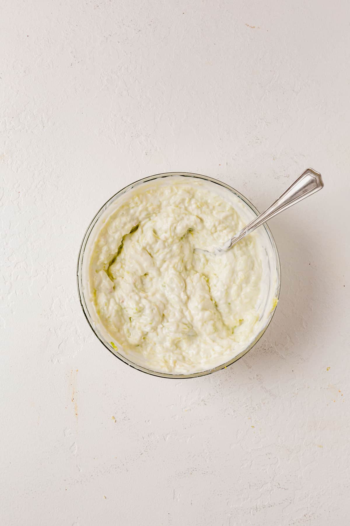 homemade tzatziki in a small mixing bowl.