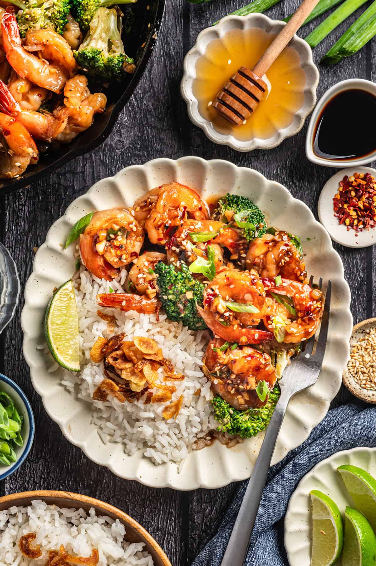 Honey Garlic Shrimp with Broccoli and Coconut Rice - on a white plate.