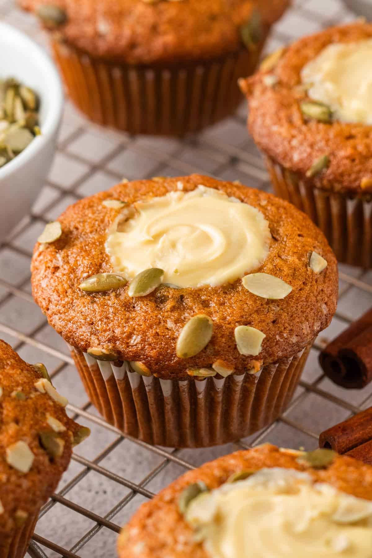 Pumpkin Cream Cheese Muffins on a rack.