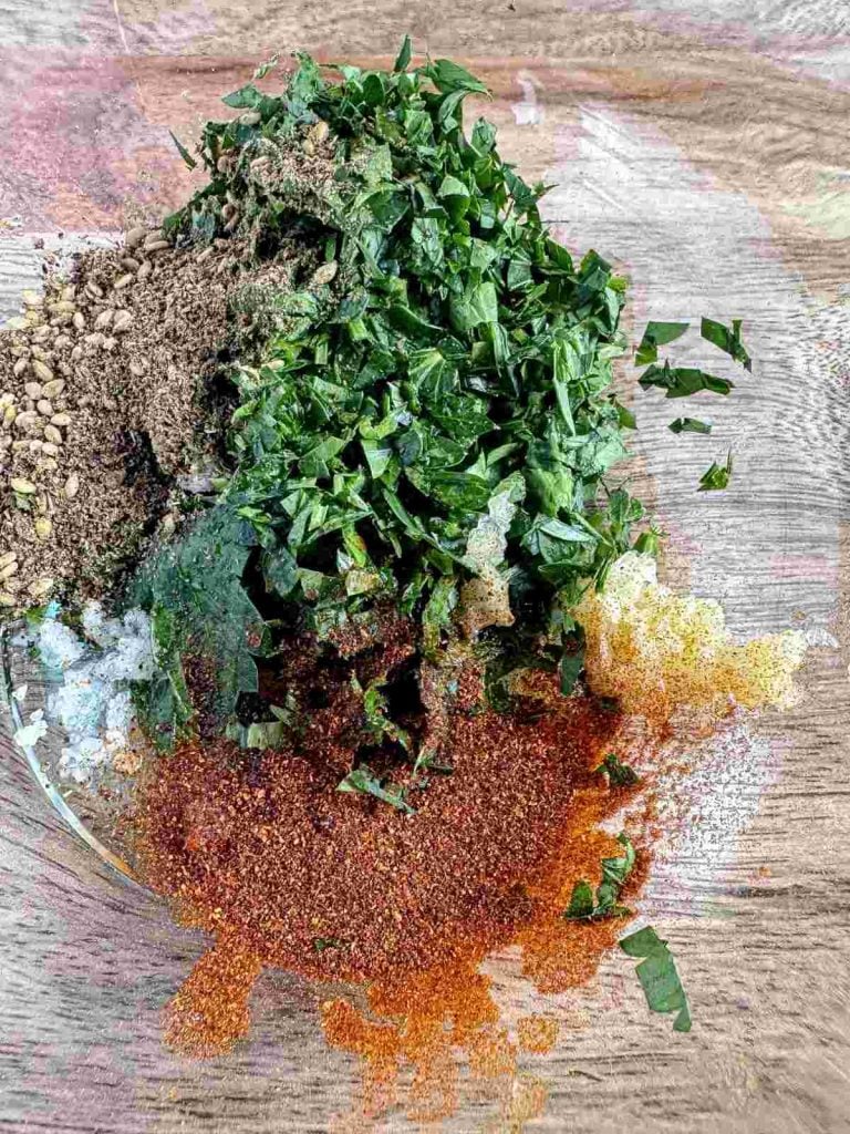 Seasoning for Crispy Roasted Cauliflower and Pine Nut Hummus in a bowl